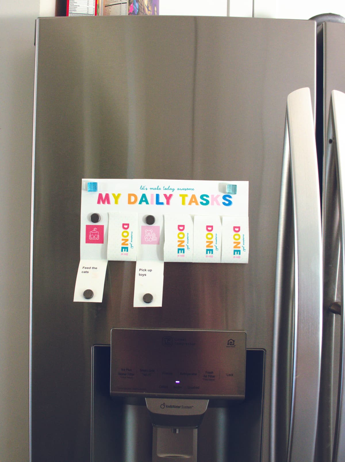 Printable daily task chore chart on refrigerator.