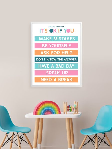 "It's ok" poster in a child's room with craft table.