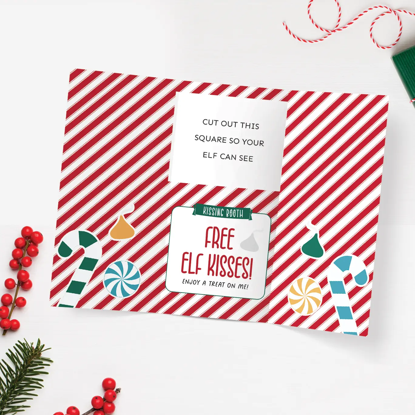 Free printable Elf on the Shelf kissing booth template.