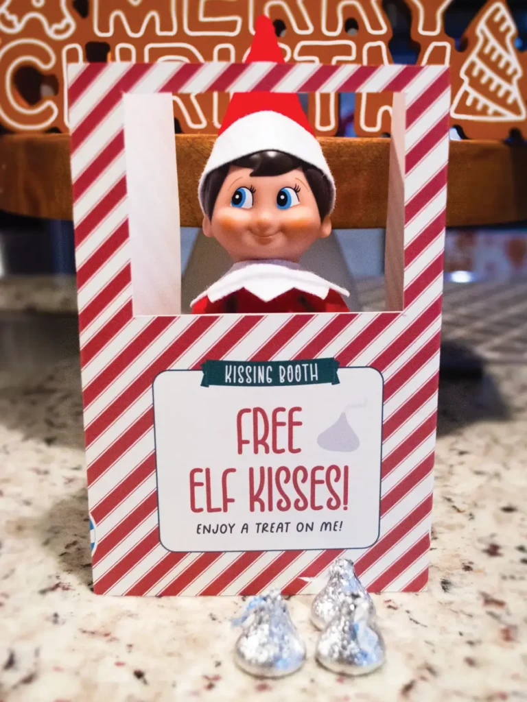 Free printable Elf on the Shelf kissing booth.